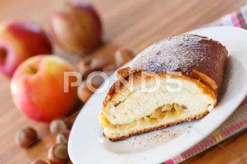 Sweet strudel with apples Stock Photos