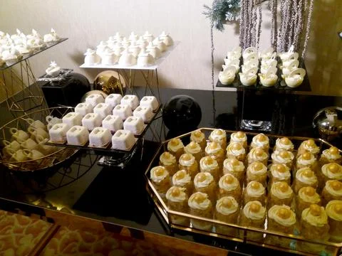 Sweet Table Display Featuring an Array of Festive Desserts at a Corporate P.. Stock Photos