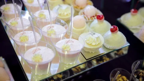 Sweet table. white chocolate. mousse. sweet snacks with white chokolate hearts Stock Footage 118300896