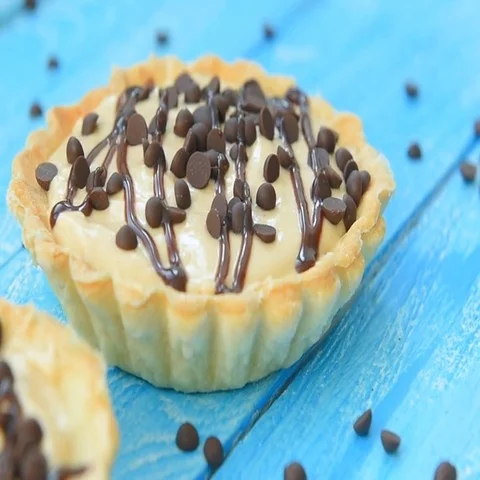 Sweet tartlet with peanut cream and chocolate Stock Footage
