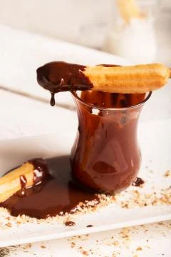 Sweet Tasty Eclair with chocolate Stock Photos