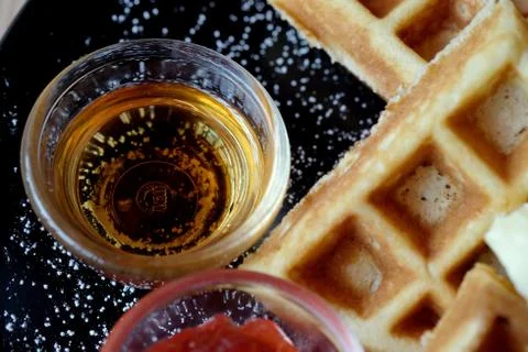 Sweet waffle dish, Close up to syrup. Stockfoto's
