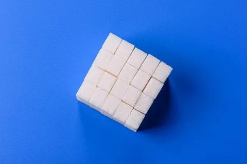 Sweet white sugar cubes as a source of glucose. White sugar cubes as a food.. 写真素材