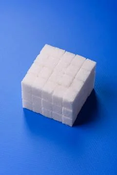 Sweet white sugar cubes as a source of glucose. White sugar cubes as a food.. 写真素材