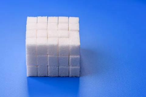 Sweet white sugar cubes as a source of glucose. White sugar cubes as a food.. 写真素材