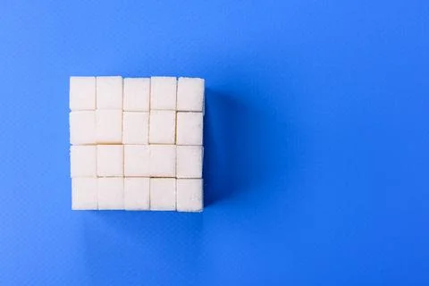 Sweet white sugar cubes as a source of glucose. White sugar cubes as a food.. 写真素材