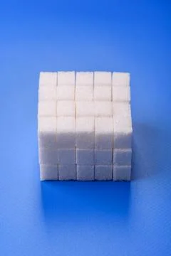 Sweet white sugar cubes as a source of glucose. White sugar cubes as a food.. 写真素材