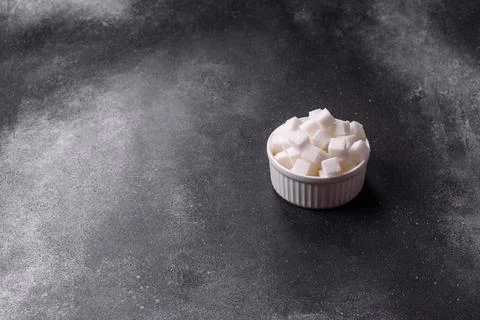 Sweet white sugar cubes as a source of glucose. White sugar cubes as a food.. 写真素材