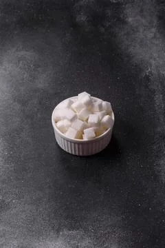 Sweet white sugar cubes as a source of glucose. White sugar cubes as a food.. 写真素材