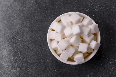 Sweet white sugar cubes as a source of glucose. White sugar cubes as a food.. 写真素材