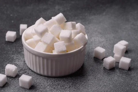 Sweet white sugar cubes as a source of glucose. White sugar cubes as a food.. 写真素材