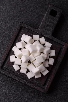 Sweet white sugar cubes as a source of glucose. White sugar cubes as a food.. 写真素材