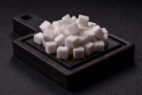 Sweet white sugar cubes as a source of glucose. White sugar cubes as a food.. 写真素材