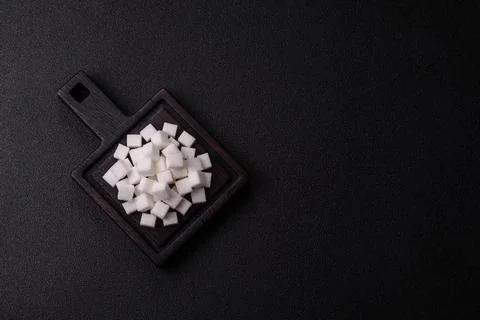 Sweet white sugar cubes as a source of glucose. White sugar cubes as a food.. 写真素材