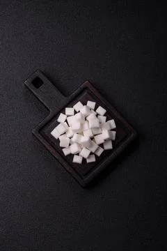 Sweet white sugar cubes as a source of glucose. White sugar cubes as a food.. 写真素材