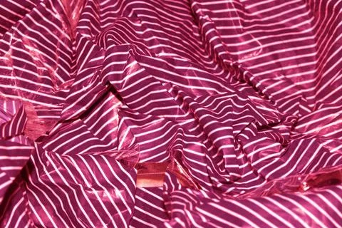 Sweet Wrapper Fine Stripes Lines on Plastic Paper Crumpled Warped Vertical .. Foto stock
