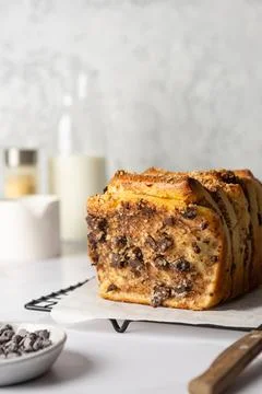 Sweet yeast pull-apart bread with cream cheese, chocolate, prunes and nuts Stock Photos