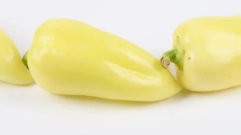 Sweet yellow peppers close-up. Sweet yellow peppers in row. Stock Footage 170781153