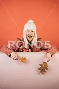 Sweet young woman wearing in autumn clothes on autumn rain day. Beautiful girl Stock Photos