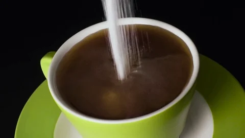 Sweetener from the package to pour into tea Video stock 74268305