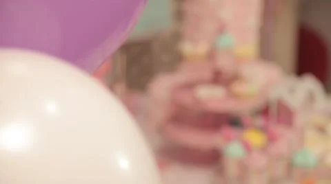 Sweets and decorations on the table to celebrate 1 year baby Stock Footage 63783331