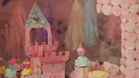 Sweets and decorations on the table to celebrate 1 year baby Stock Footage 63783351