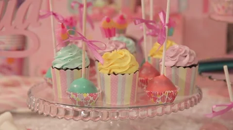 Sweets and decorations on the table to celebrate 1 year baby Video stock 63783400
