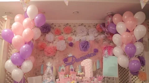 Sweets and decorations on the table to celebrate 1 year baby Stock Footage 63783437