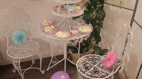 Sweets and decorations on the table to celebrate 1 year baby Video stock 63783439