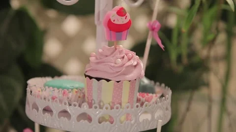 Sweets and decorations on the table to celebrate 1 year baby Video stock 63783453