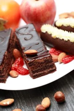 Sweets and fruits Stock Photos