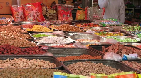 Sweets &amp; bees at bazaar Stock Footage 522462