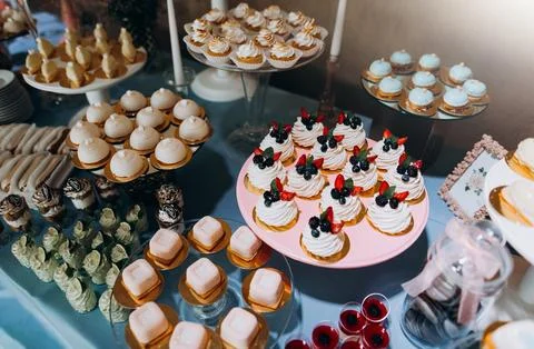 Sweets on the buffet table. candy bar for birthday. confectionery on the tabl Stock Photos