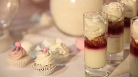 Sweets cake cakes and marshmallows on the table Stock Footage 64289658