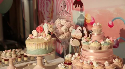 Sweets cake cakes and marshmallows on the table Stock Footage 64290251
