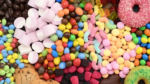 Sweets, candy, cookies, donuts and other food containing sugar Stock Footage 135081347