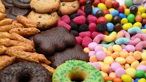 Sweets, candy, cookies, donuts and other food containing sugar Stock Footage 135083630