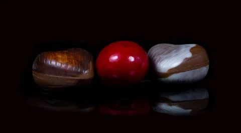 Sweets with cherries on the table. With black background Stock Photos