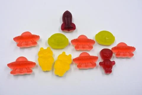 Sweets in the form of various alien, astronauts, UFOs, spaceships, rockets. Foto stock