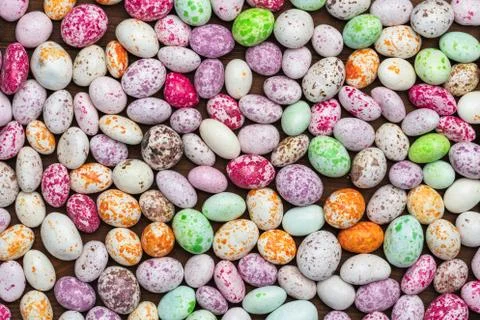 Sweets imitating multi-colored pebbles. Stock Photos