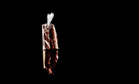 Sweets in plastic food packaging with reflection and copy space Foto stock