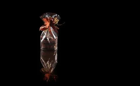 Sweets in plastic food packaging with reflection and copy space Stock Photos