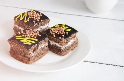 Sweets for tea on a white background. Stock Photos