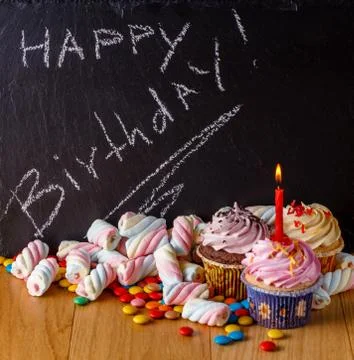 Sweets with text place on slate Stock Photos