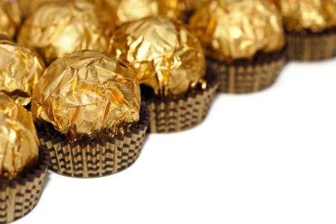 Sweets in wrapper isolated Stock Photos