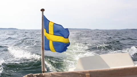 Sweish flag wave in the wind aft stern a boat. Stock Footage 212149751
