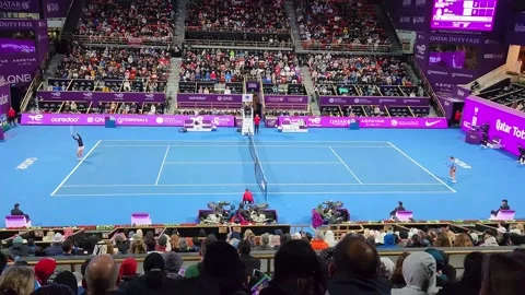 Swiatek Serves to Perula in Qatar Open Tennis Final Stock Footage 233492701