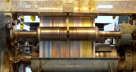 Swift roller pin printing house ink transfer batches on newspapers Stock Footage 156896431