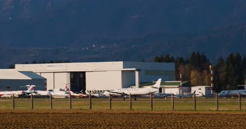 Swiftair Hellas passenger airplane vacating the runway after landing Stock Footage 221174406