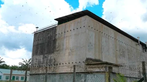 Swiftlets House Exterior Long Shot (Edible Bird Nest Industry) Stock Footage 106914287